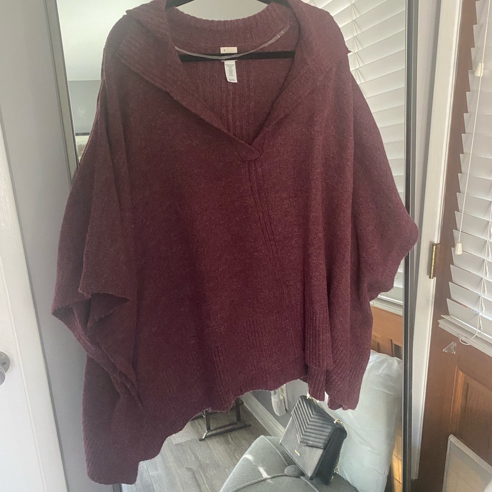 A. New. Day poncho / one size fits all.